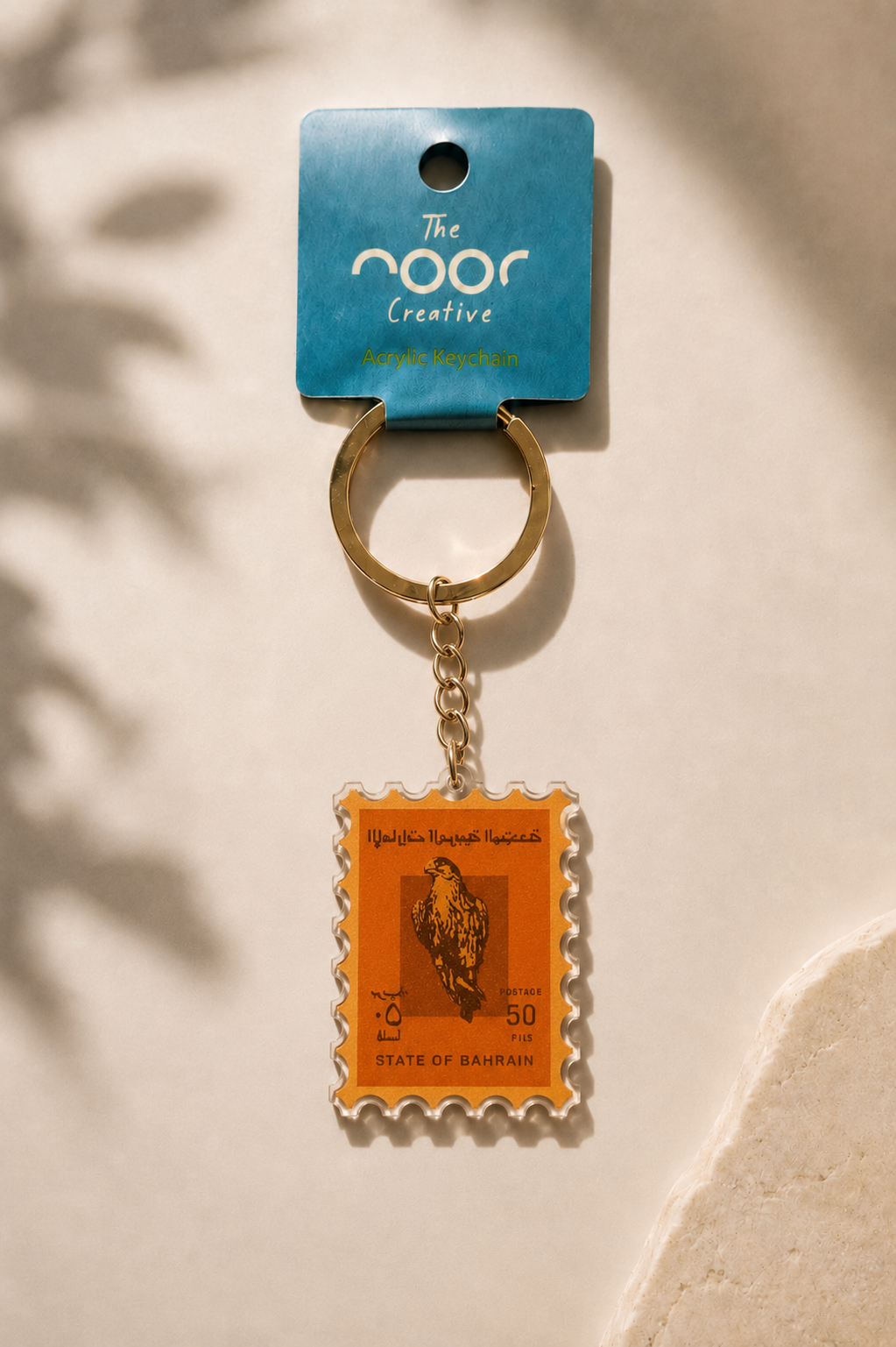 Falcon Stamp Keychain