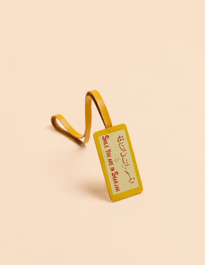Smile You're In Sharjah Leather Charm